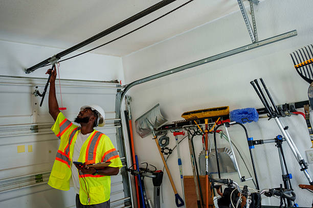 Professional Garage Door Panel Replacement technician working in Oakland City, IN
